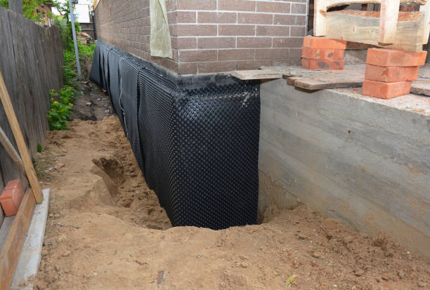 SJ Waterproofing Pros technician performing targeted Exterior Waterproofing assessment in Morrisville, PA